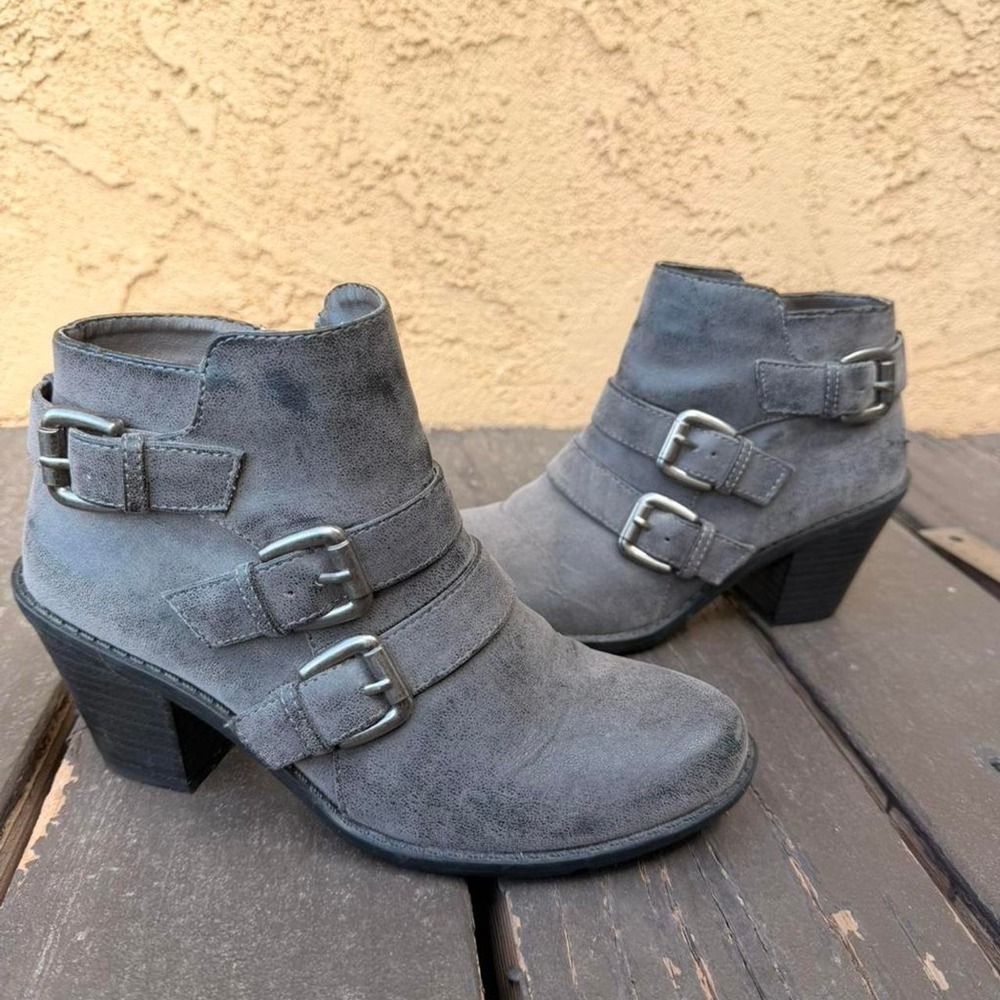 Grey suede ankle boots with buckle detail